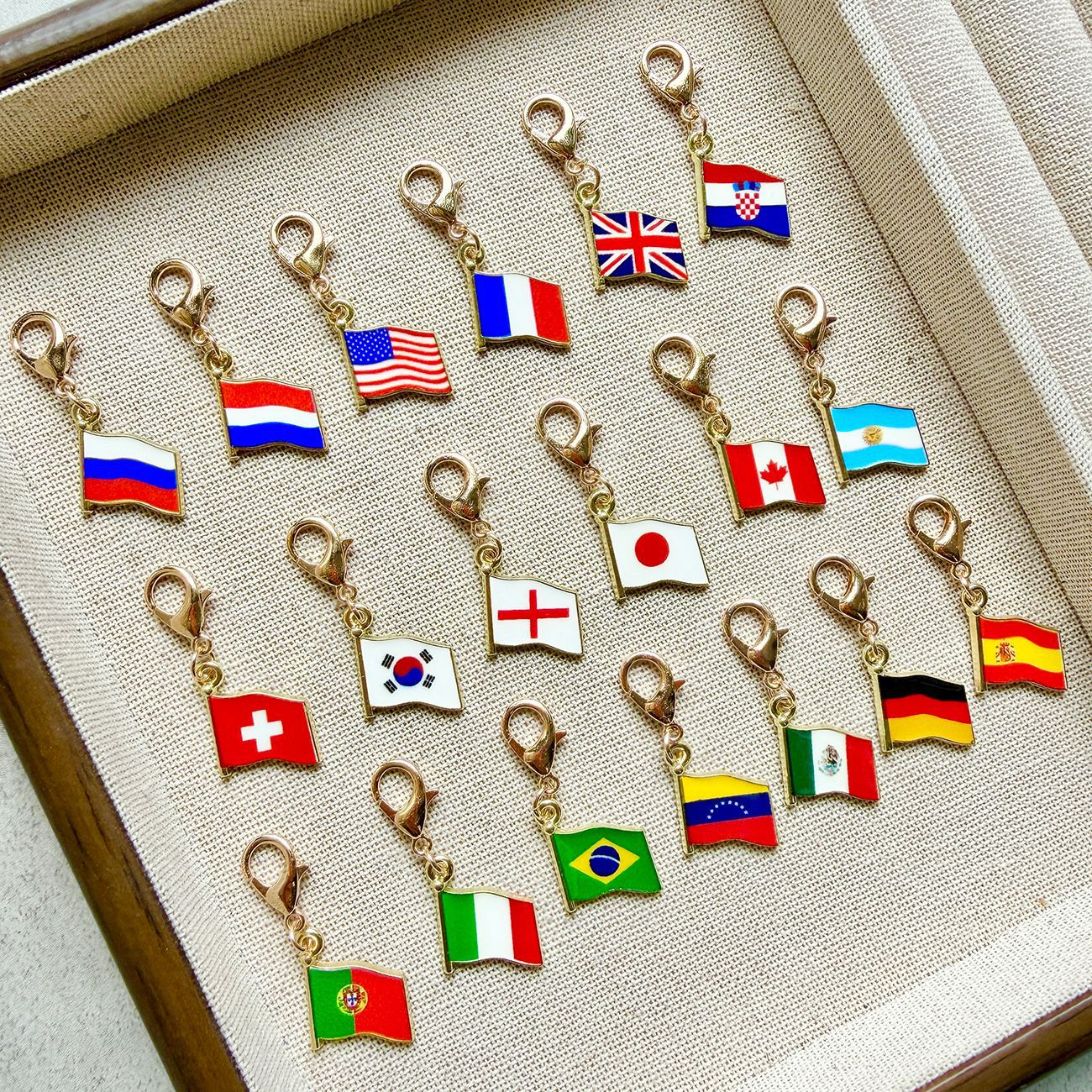 National Flag Key Chains With Bag Charms In Zinc Alloy For New Year Celebration